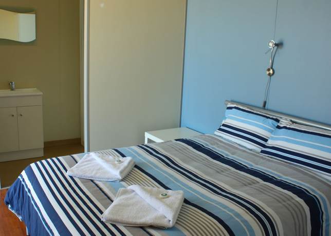 Imagen de la habitación del Hotel Merinda Village. Foto 7