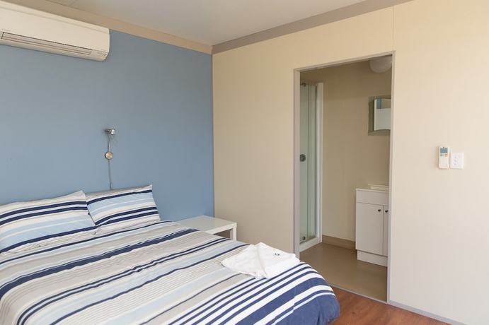 Imagen de la habitación del Hotel Merinda Village. Foto 9