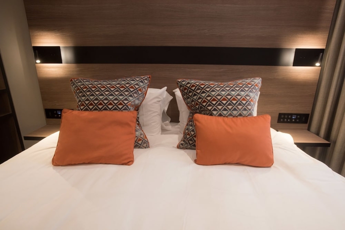 Imagen de la habitación del Hotel Merit Kensington. Foto 10