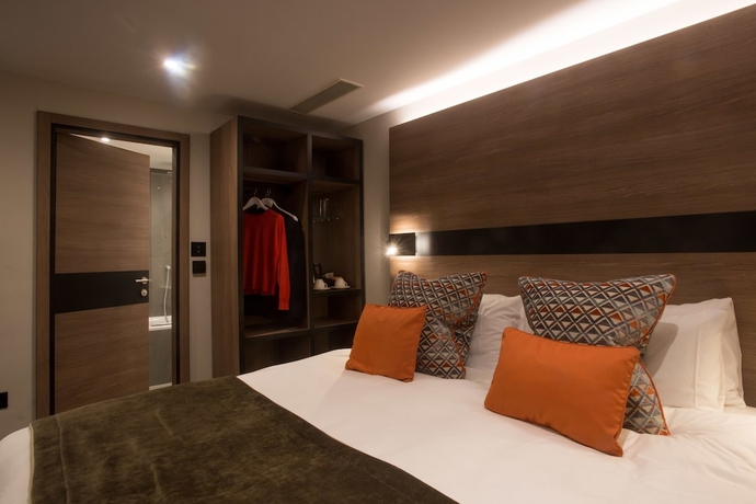Imagen de la habitación del Hotel Merit Kensington. Foto 13