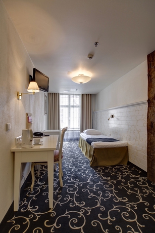 Imagen de la habitación del Hotel Meriton Old Town Garden. Foto 4