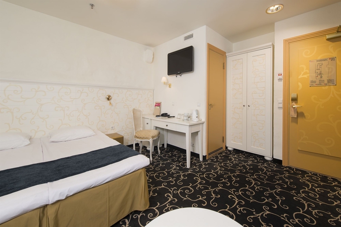 Imagen de la habitación del Hotel Meriton Old Town Garden. Foto 11