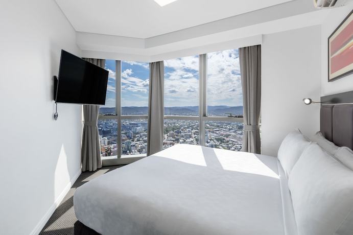Imagen de la habitación del Hotel Meriton Suites Adelaide Street, Brisbane. Foto 2