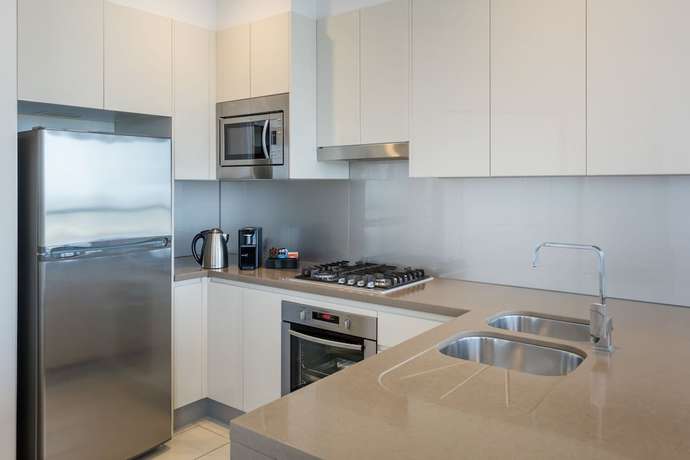 Imagen de la habitación del Hotel Meriton Suites Adelaide Street, Brisbane. Foto 13