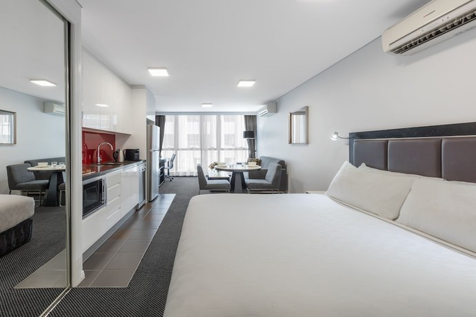 Imagen de la habitación del Hotel Meriton Suites Adelaide Street, Brisbane. Foto 17