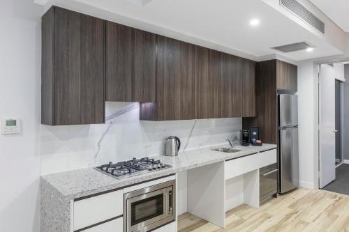 Imagen de la habitación del Hotel Meriton Suites Church Street, Parramatta. Foto 10