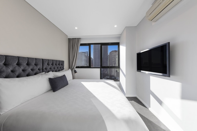 Imagen de la habitación del Hotel Meriton Suites Kent Street, Sydney. Foto 6