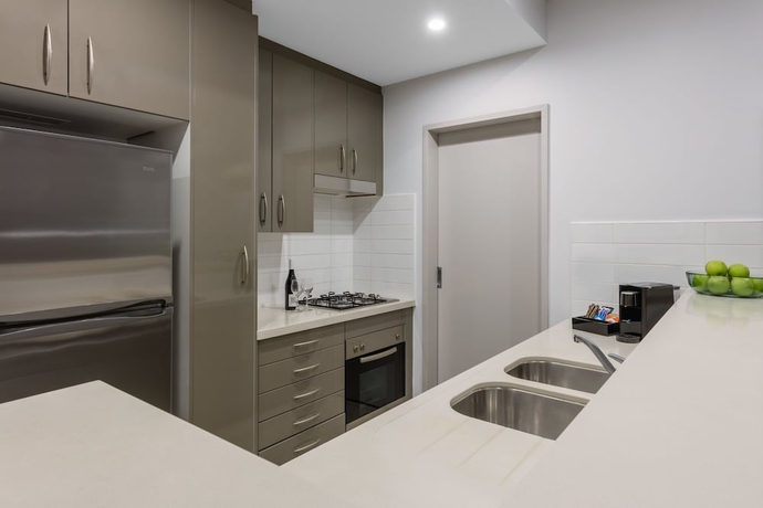 Imagen de la habitación del Hotel Meriton Suites Kent Street, Sydney. Foto 7