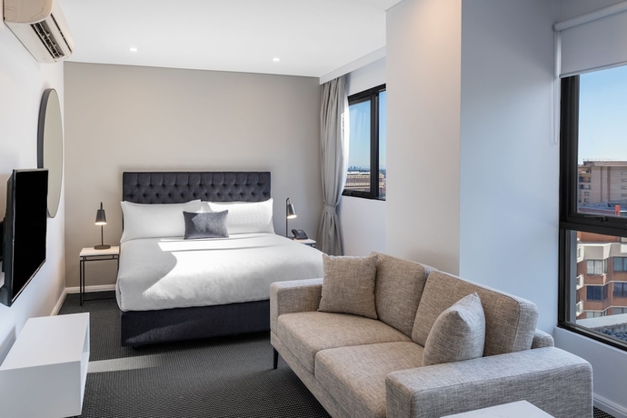 Imagen de la habitación del Hotel Meriton Suites Kent Street, Sydney. Foto 18