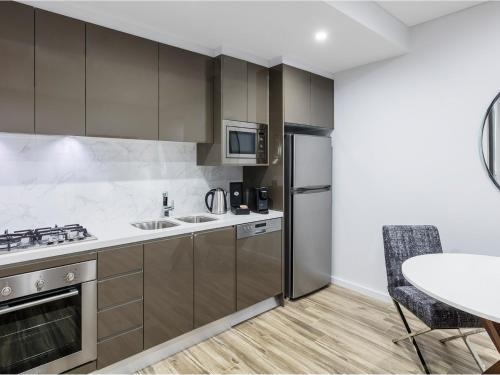 Imagen de la habitación del Hotel Meriton Suites Mascot Central. Foto 6
