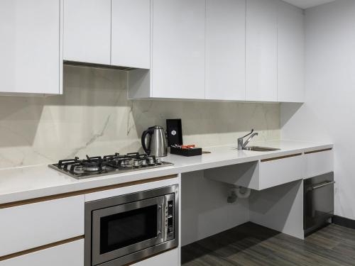 Imagen de la habitación del Hotel Meriton Suites Mascot Central. Foto 9
