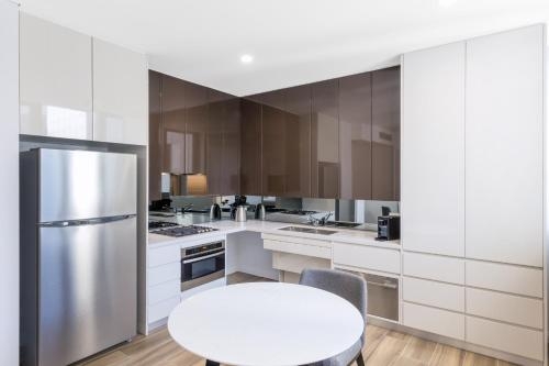 Imagen de la habitación del Hotel Meriton Suites Sydney Airport. Foto 7