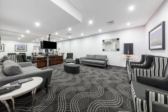Imagen del bar/restaurante del Hotel Meriton Suites World Tower, Sydney. Foto 2