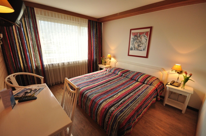 Imagen de la habitación del Hotel Merkur Interlaken. Foto 5