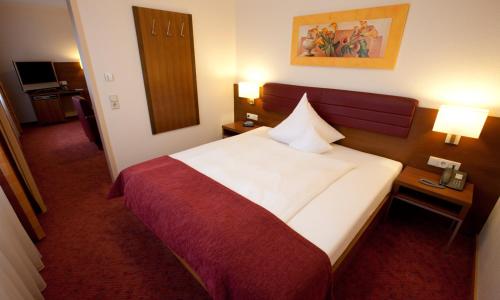 Imagen de la habitación del Hotel Merkur, Ramstein-Miesenbach. Foto 7
