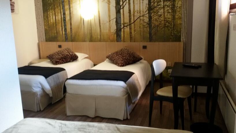 Imagen de la habitación del Hotel Merle Blanc. Foto 14