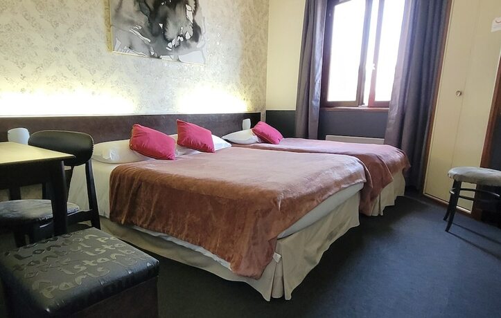 Imagen de la habitación del Hotel Merle Blanc. Foto 19