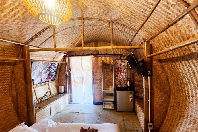 Imagen de la habitación del Hotel Merlin Hut and Farm. Foto 3