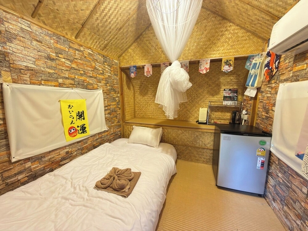 Imagen de la habitación del Hotel Merlin Hut and Farm. Foto 9