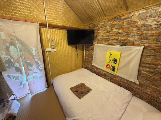 Imagen de la habitación del Hotel Merlin Hut and Farm. Foto 12