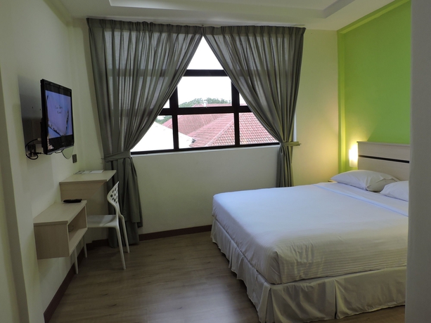 Imagen de la habitación del Hotel Merlin, Penang. Foto 4