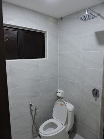 Imagen de la habitación del Hotel Merlin, Penang. Foto 7