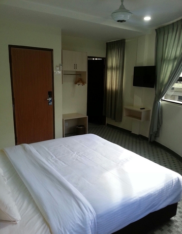 Imagen de la habitación del Hotel Merlin, Penang. Foto 11