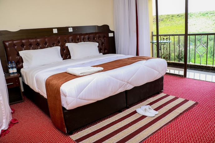Imagen de la habitación del Hotel Merlin Resort. Foto 10