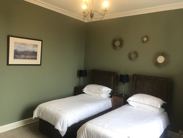 Imagen de la habitación del Hotel Merlindale. Foto 6