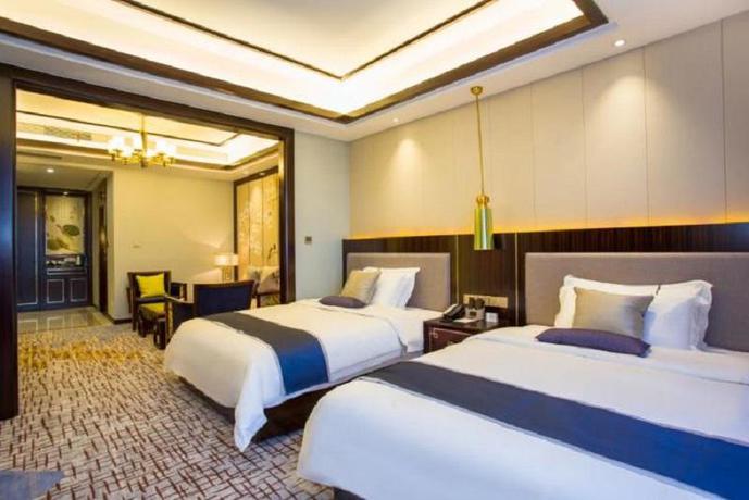 Imagen de la habitación del Hotel Merlinhod Hotel Shanghai Baoshan. Foto 10