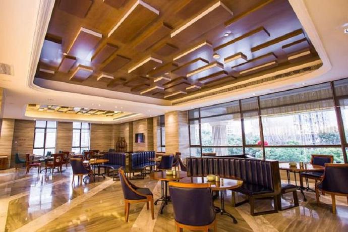 Imagen del bar/restaurante del Hotel Merlinhod Hotel Shanghai Baoshan. Foto 6