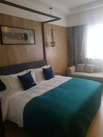 Imagen de la habitación del Hotel Merlinhod Shanghai North Hongqiao. Foto 3
