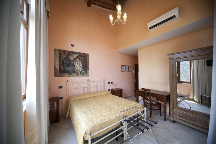Imagen de la habitación del Hotel Merlini. Foto 2