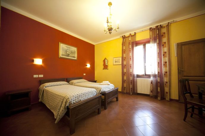 Imagen de la habitación del Hotel Merlini. Foto 7