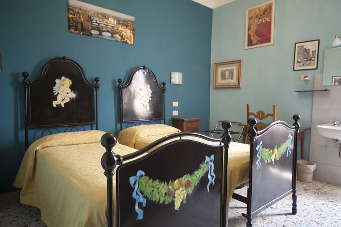 Imagen de la habitación del Hotel Merlini. Foto 12