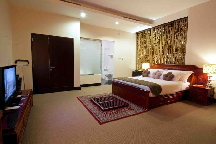 Imagen de la habitación del Hotel Merlynn Park. Foto 4