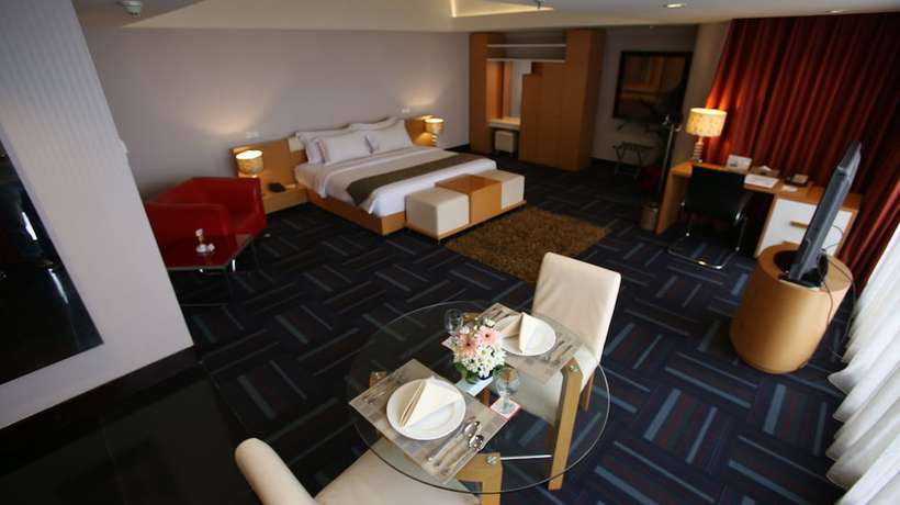 Imagen de la habitación del Hotel Merlynn Park. Foto 6