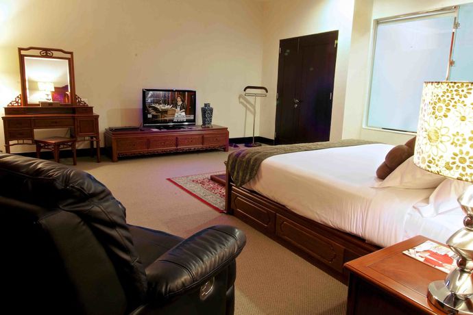 Imagen de la habitación del Hotel Merlynn Park. Foto 9