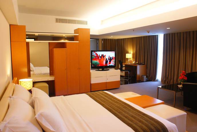 Imagen de la habitación del Hotel Merlynn Park. Foto 18