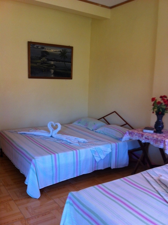 Imagen de la habitación del Hotel Merly's Place Cottages. Foto 2