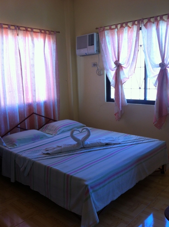 Imagen de la habitación del Hotel Merly's Place Cottages. Foto 4