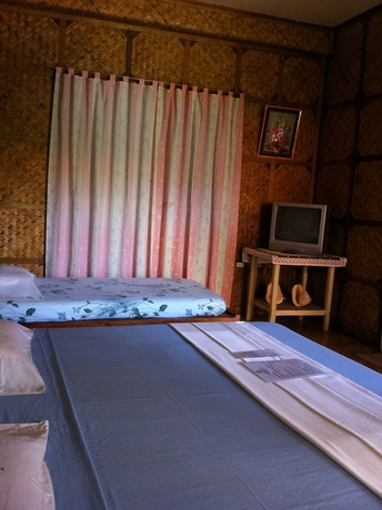 Imagen de la habitación del Hotel Merly's Place Cottages. Foto 5