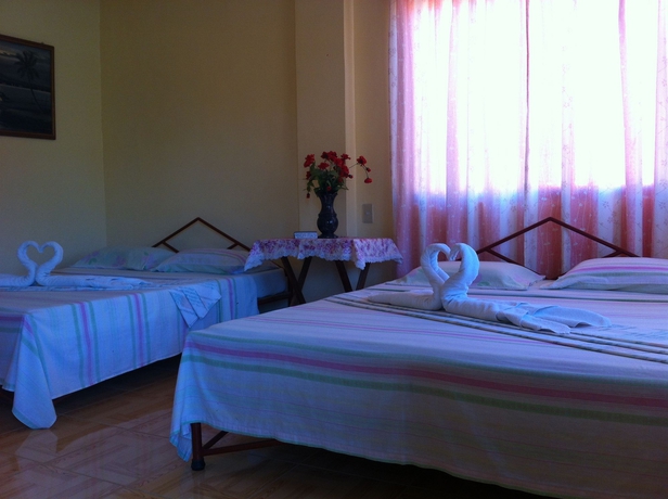 Imagen de la habitación del Hotel Merly's Place Cottages. Foto 6