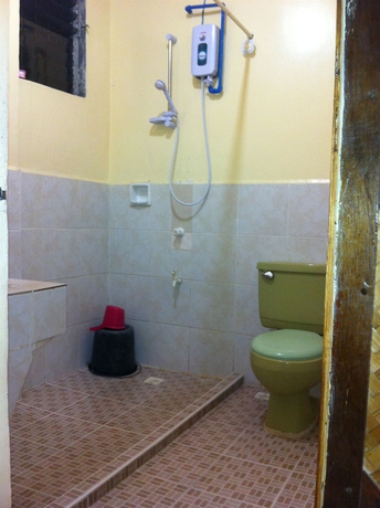 Imagen de la habitación del Hotel Merly's Place Cottages. Foto 11