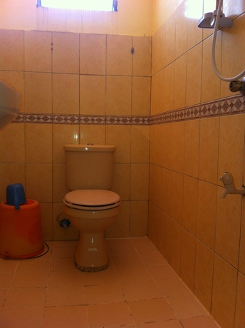 Imagen de la habitación del Hotel Merly's Place Cottages. Foto 12