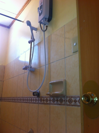 Imagen de la habitación del Hotel Merly's Place Cottages. Foto 13