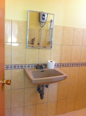 Imagen de la habitación del Hotel Merly's Place Cottages. Foto 15