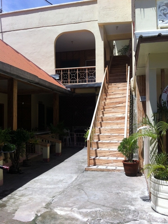 Imagen de los exteriores del Hotel Merly's Place Cottages. Foto 16