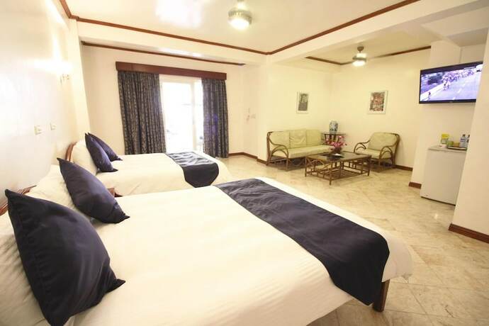 Imagen de la habitación del Hotel Mermaid Resort Puerto Galera. Foto 15