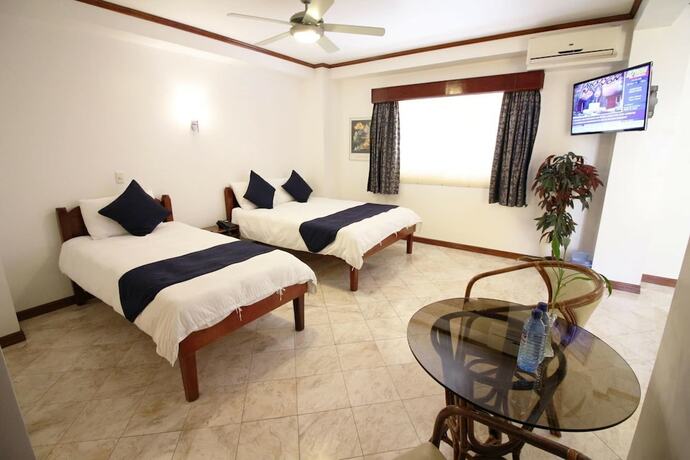Imagen de la habitación del Hotel Mermaid Resort Puerto Galera. Foto 16